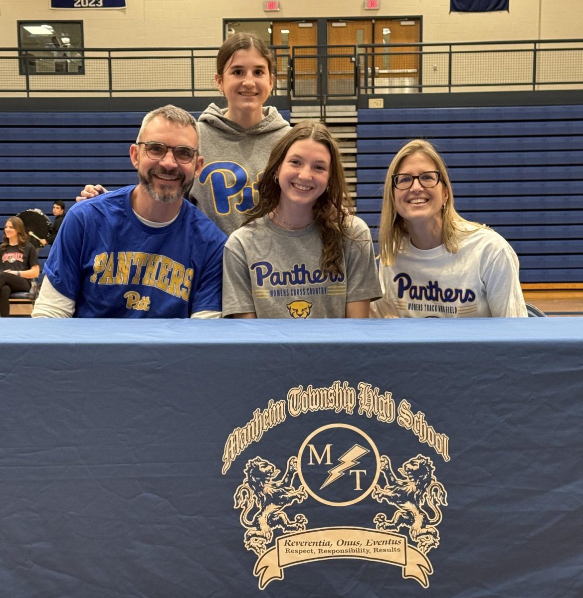 Elena Barrall, University of Pittsburgh, cross country and track & field.