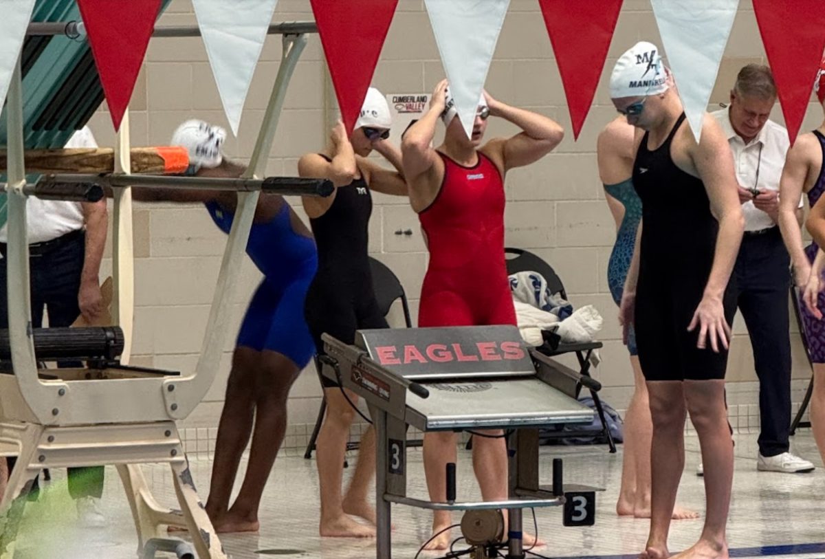 The districts medley team of Emerson Mandrell, Cami Schwartz, Isabella Del Castillo and Adora Emuwa before their race (taken by Mr. Sneeringer)