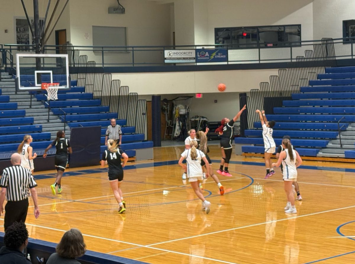 Anya Williams scoring a 3 pointer.
