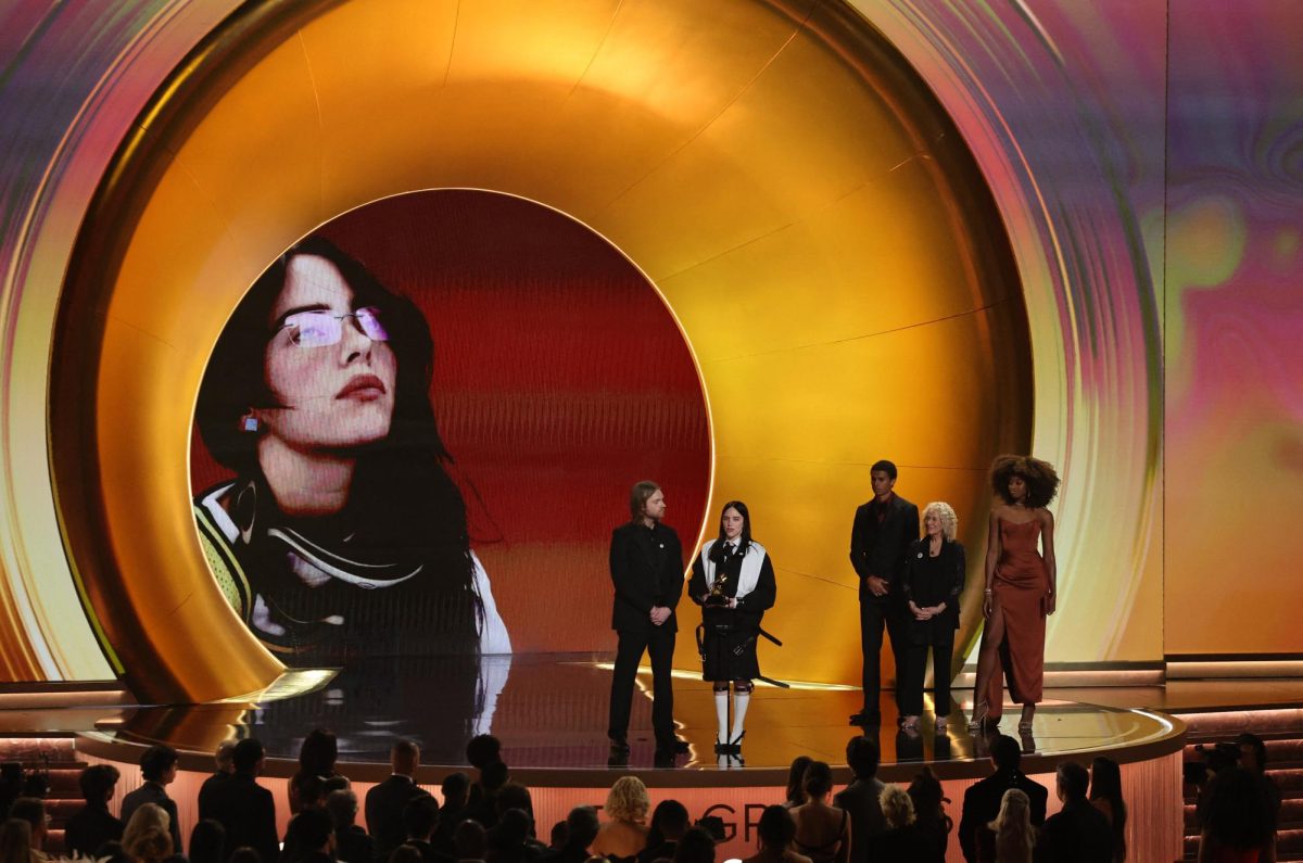 Billie Eilish accepts the award for Song of the Year for "WILDFLOWER" as Finneas looks on during the 68th Annual Grammy Awards in Los Angeles, California, U.S., February 1, 2026. REUTERS/Daniel Cole